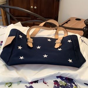 Navy blue with white embroidered stars.